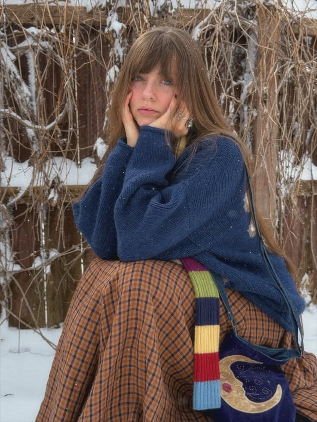 Instagram post by @hannahdrapinski for Son de Flor. Caption reads: [...] ❄️☃️ gorgeous skirt kindly gifted from....