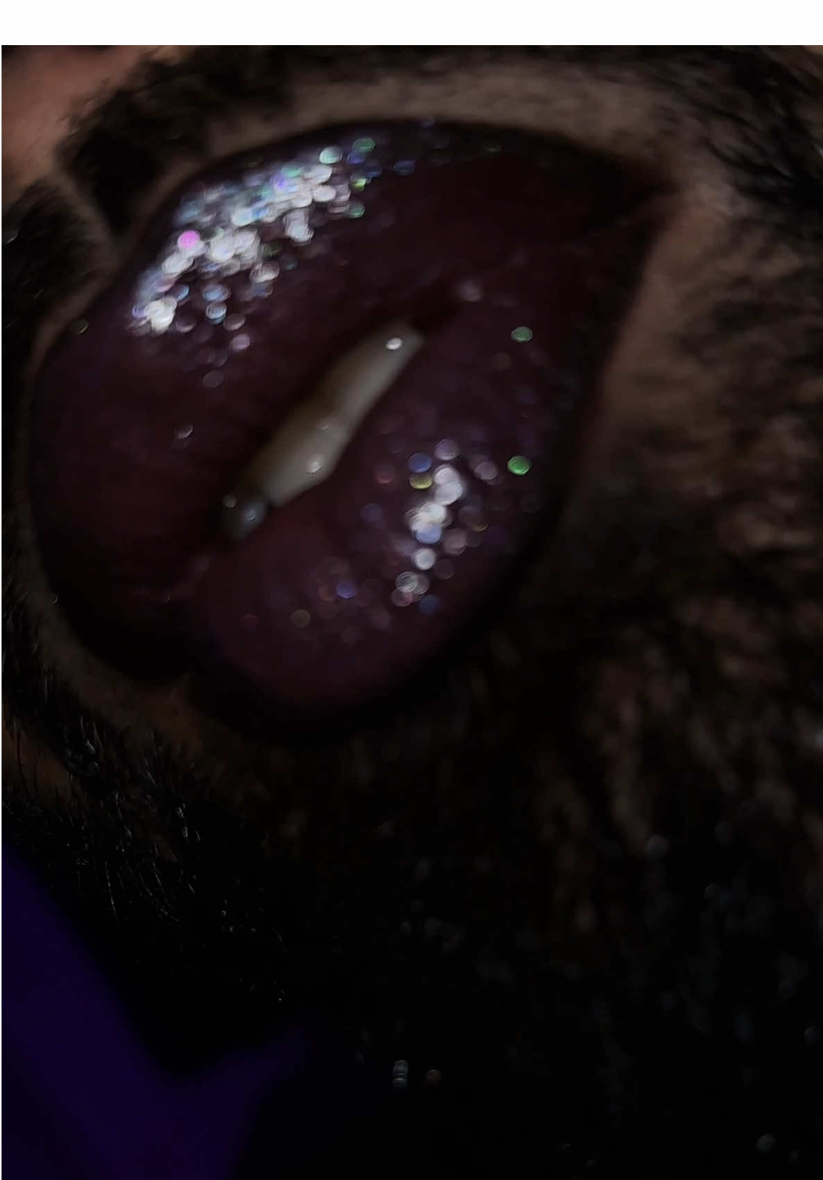 TikTok post by @kristians_makeup1 for GETSTONNED. Caption reads: [...] THE LIPS🌈 THESE ARE THE ✨GLITBALMS✨....
