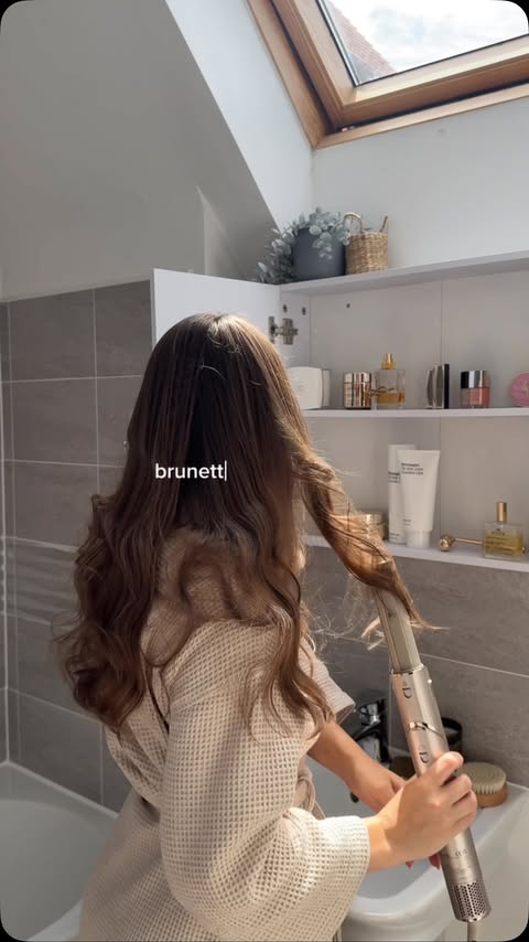 Instagram post by @withdanielle_ for Philip Kingsley. Caption reads: Brunette hair energy 🤎 Products used;....