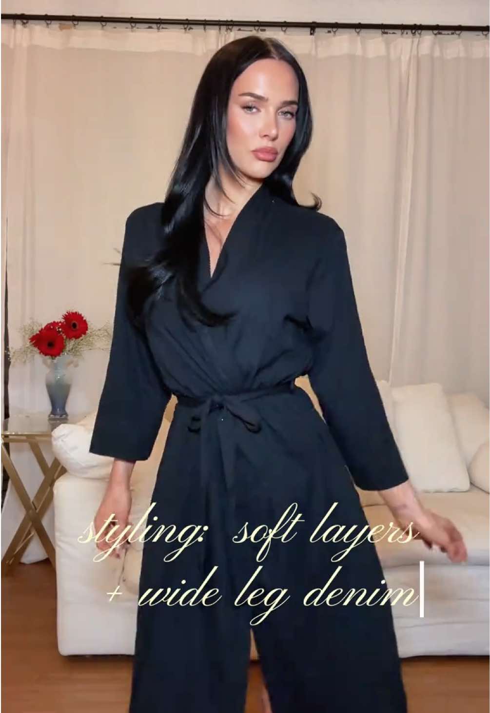 TikTok post by @genelle_ for Express. Caption reads: always soft layers + wide leg denim @Express....