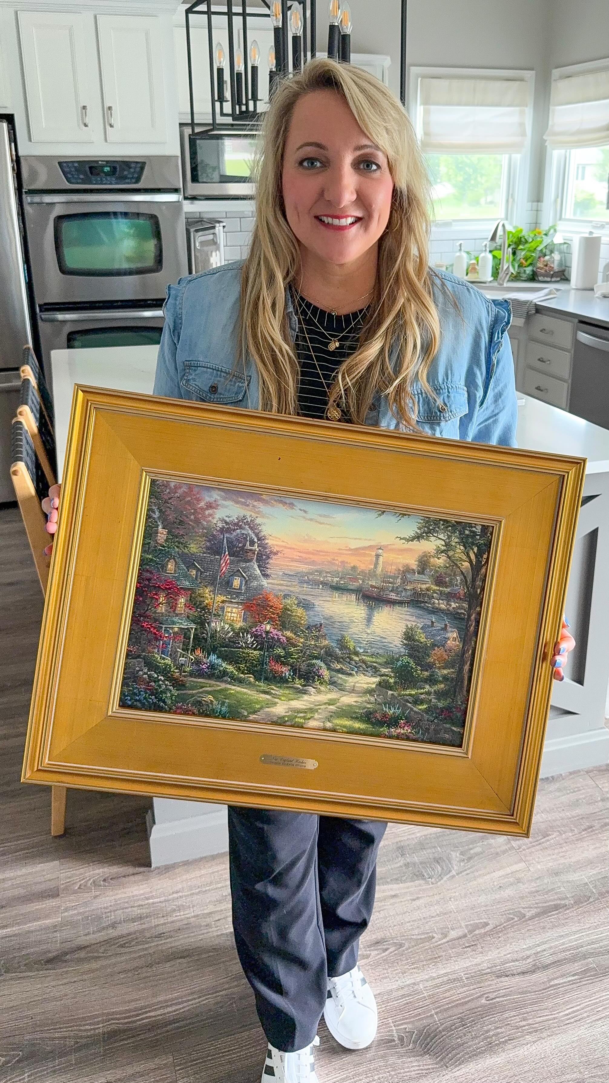 Instagram post by @coffeeandconfettimom for Thomas Kinkade Studios. Caption reads: Thomas Kinkade Giveaway 🖼️

I’m so excited to be....