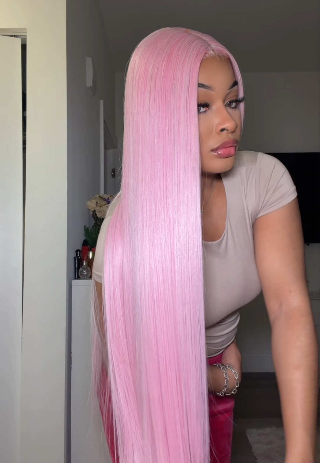 TikTok post by @misskvycee for Style Icon Hair. Caption reads: @Style Icon Hair #pinkhair #syntheticwig.