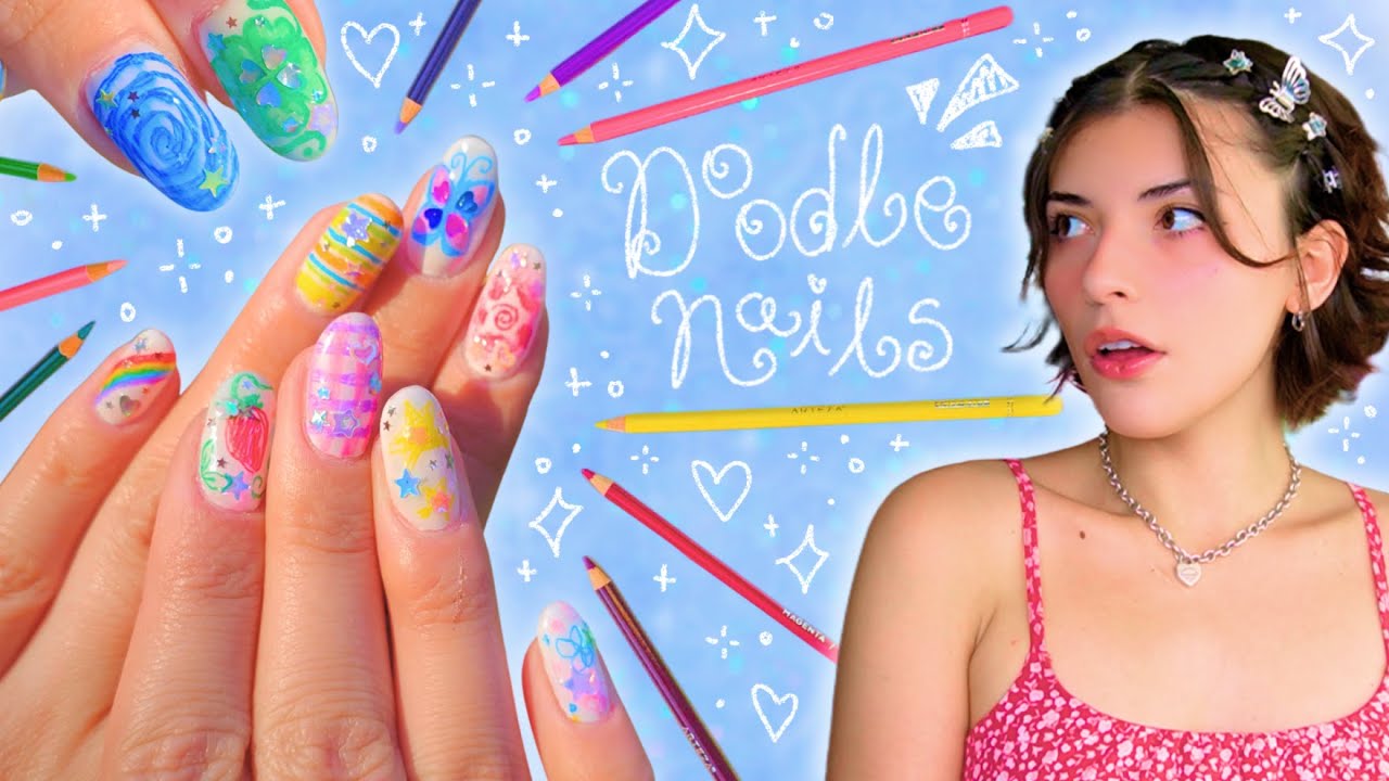 YouTube post by @TheAnneElizabeth for Bornpretty. Caption reads: ⋆.˚🌈 Using COLORED PENCILS on my NAILS (literally....