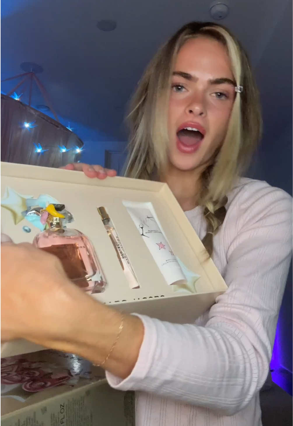 TikTok post by @summermckeen for Marc Jacobs Fragrances. Caption reads: im truly looking forward to giving and feeling joy....