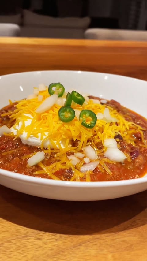 Instagram post by @ejscookin for Taste of Home. Caption reads: If loving Cincinnati chili is wrong, we don’t....