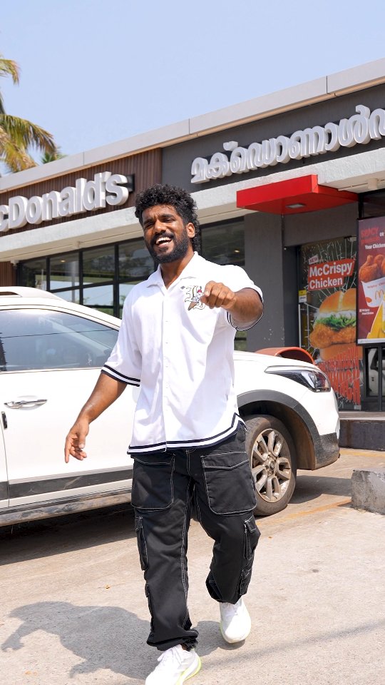 Instagram post by @arjun13mp for McDonald's India. Caption reads: Go 100 time through drive thru Get 10,000.