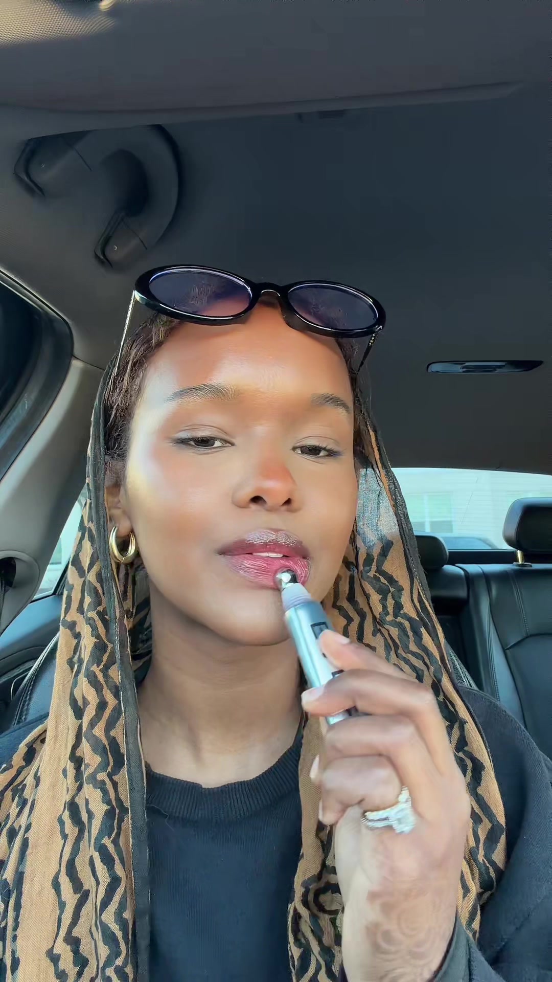 TikTok post by @ambiyofarah for Eadem. Caption reads: Juicy lips @EADEM in Bissap glaze #giftedbyeadem .