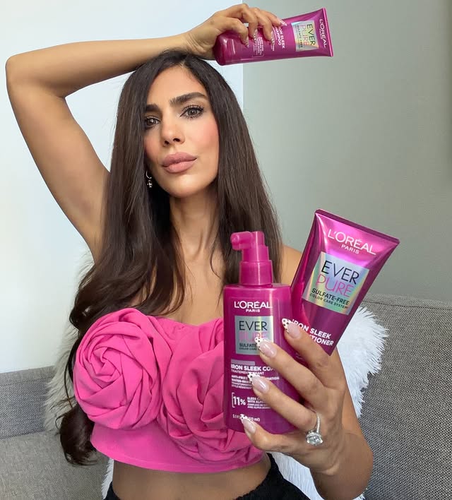 Instagram post by an influencer for L'Oréal Paris. Caption reads: POV: L’Oréal said your hair deserves main....