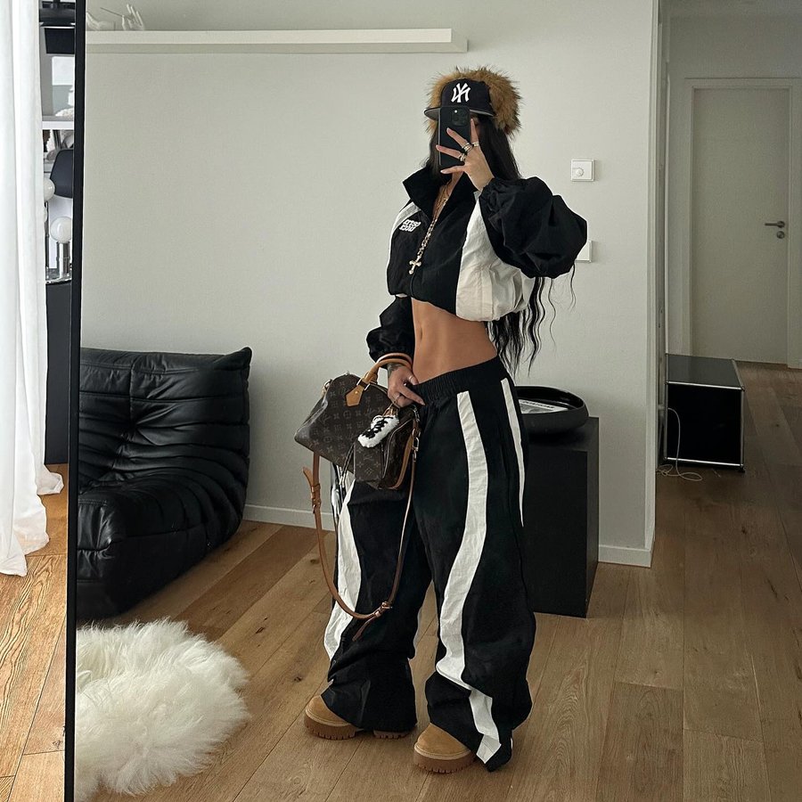 Instagram post by @blvckd0pe for Cernucci. Caption reads: 🎱 Tracksuit @cernucci |ad.