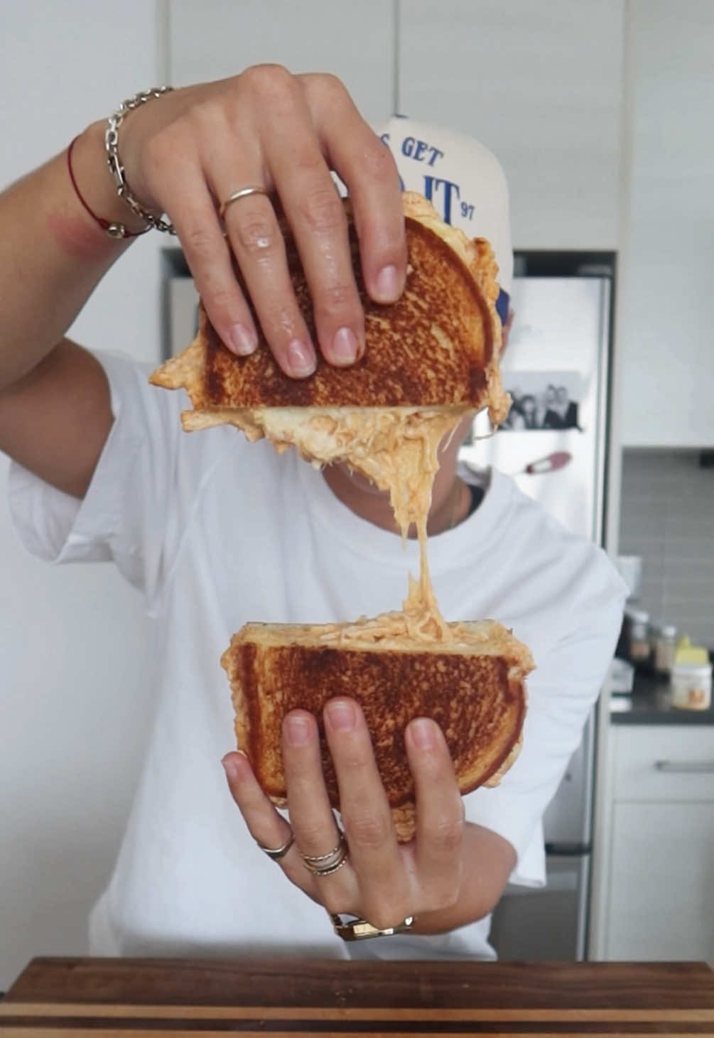 TikTok post by @lamb_chop97 for Tillamook. Caption reads: [...] chicken grilled cheese 🌶️🧀🍞 ft.....