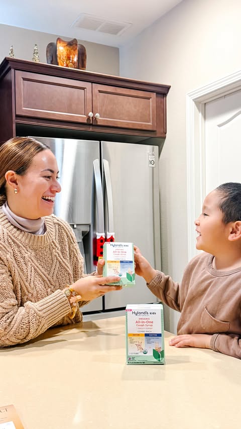 Instagram post by @_growinglittlehumans_ for Hyland's Naturals. Caption reads: Cold season always keeps me on my toes as a mom —....