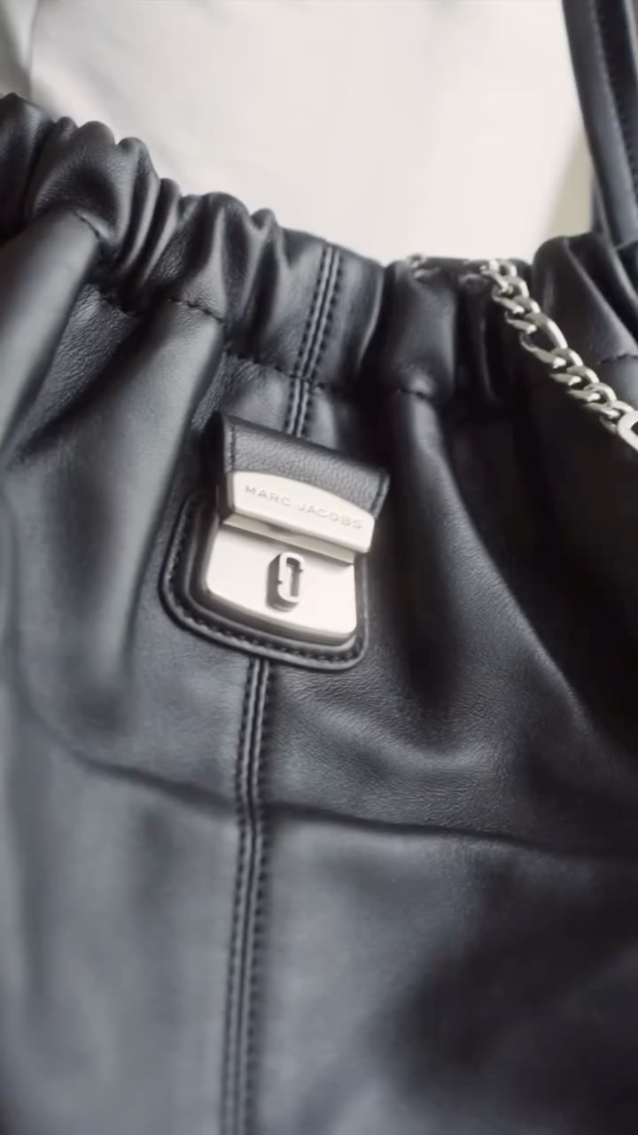 Instagram post by @janinamanipol for Marc Jacobs. Caption reads: [...] my new everyday essential from @marcjacobs....