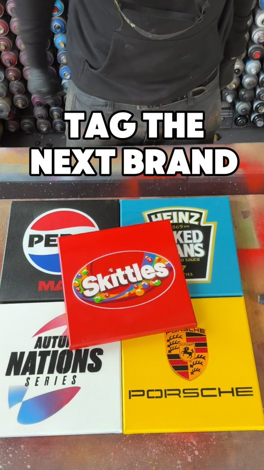 Instagram post by @tomwellywells for SKITTLES. Caption reads: When @skittles meets spray paint! #brand #logoart....