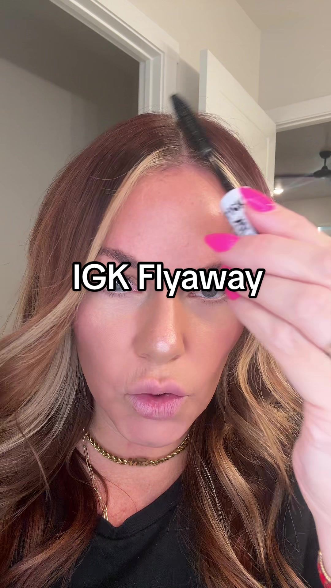 TikTok post by @trendin.with.em for IGK Hair. Caption reads: Obsessed with @IGK Hair #slickstick this is the....