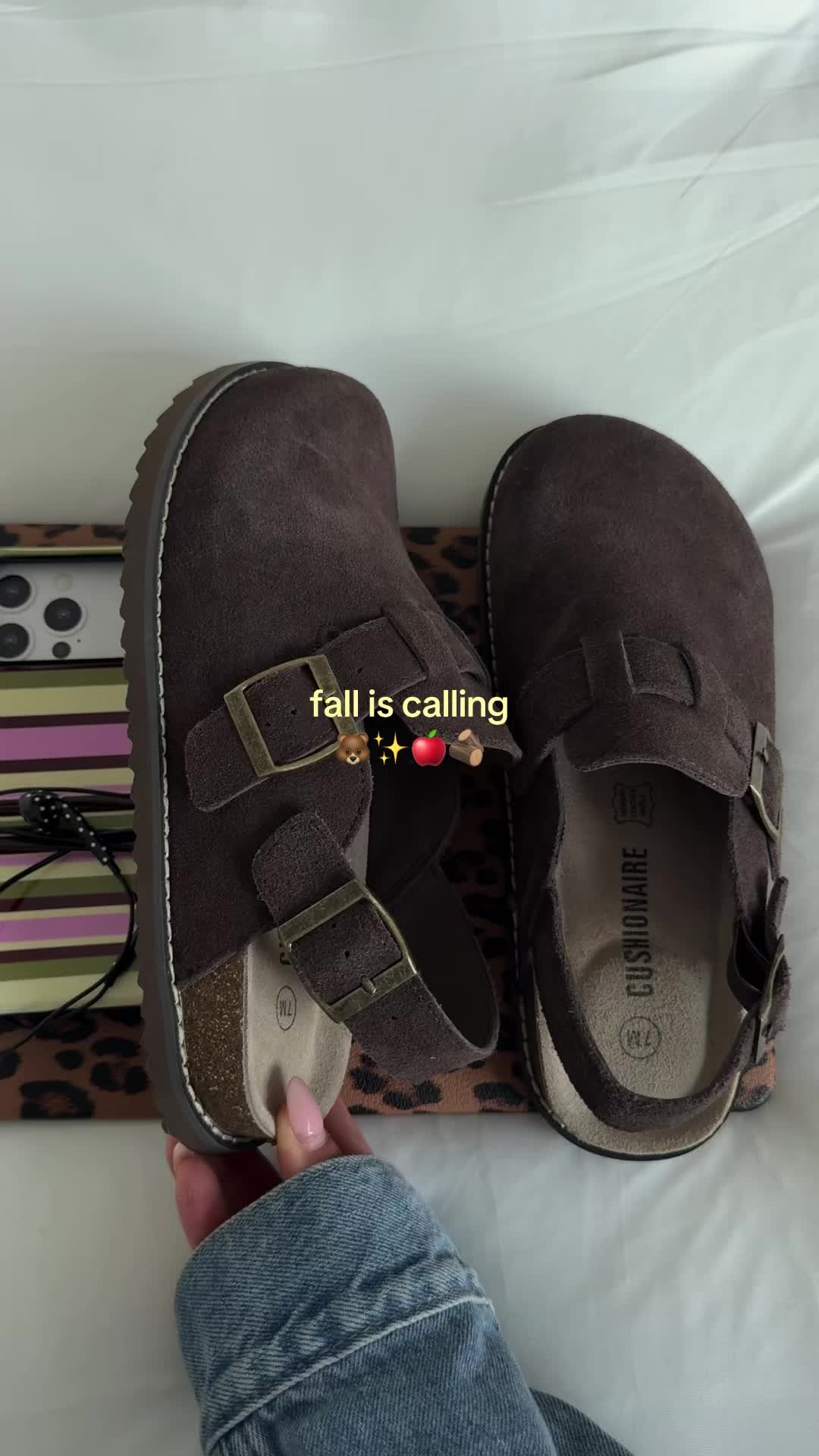 TikTok post by @gracesynod_ for Cushionaire. Caption reads: [...] official suede clogs of the fall 🪵....