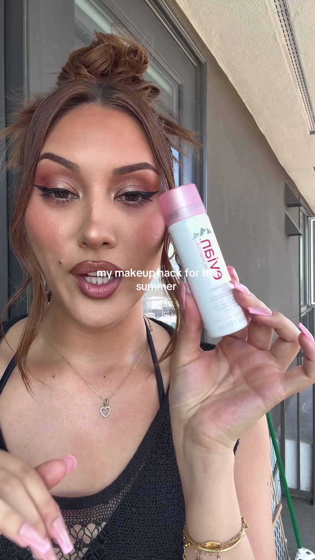 TikTok post by @love__lesss for Evian Facial Spray USA. Caption reads: Iykyk!!!! @Evian Facial Spray #evianfacemist....