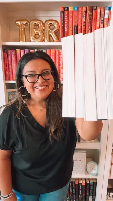 Instagram post by @therealbookhustler for Bloom Books. Caption reads: I can’t let this week go by without putting these....