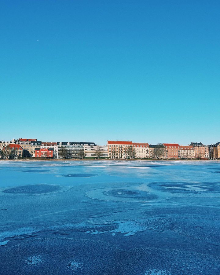 Instagram post by @niomismart for Joules. Caption reads: Sunny snowy days in Copenhagen 🇩🇰🫶..