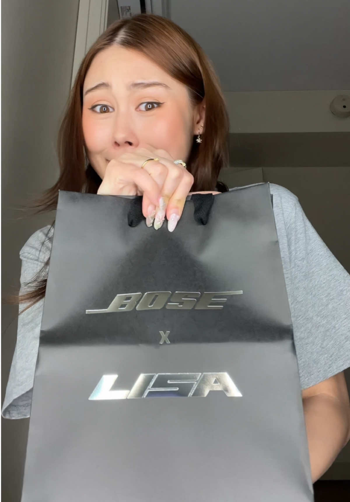 TikTok post by @erikatitus for Bose. Caption reads: gonna take a walk and feel rly hot @Bose @LISA....