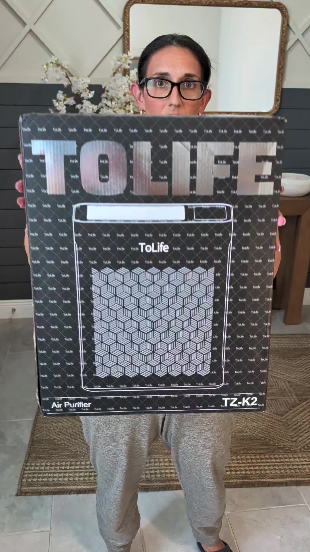 TikTok post by @alldaymomof3 for ToLife. Caption reads: [...] airport purifier is a game changer ✨ @ToLife....
