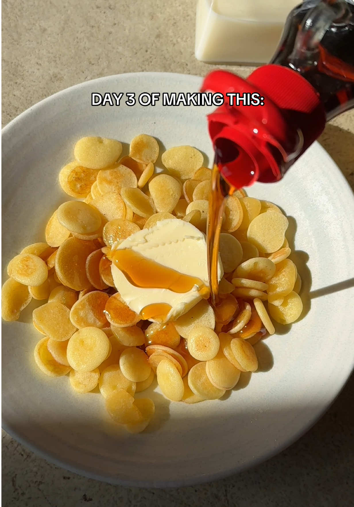 TikTok post by @rrayyme for Garden of Life. Caption reads: 🥞PROTEIN PANCAKE CEREAL! Breakfast has turned....