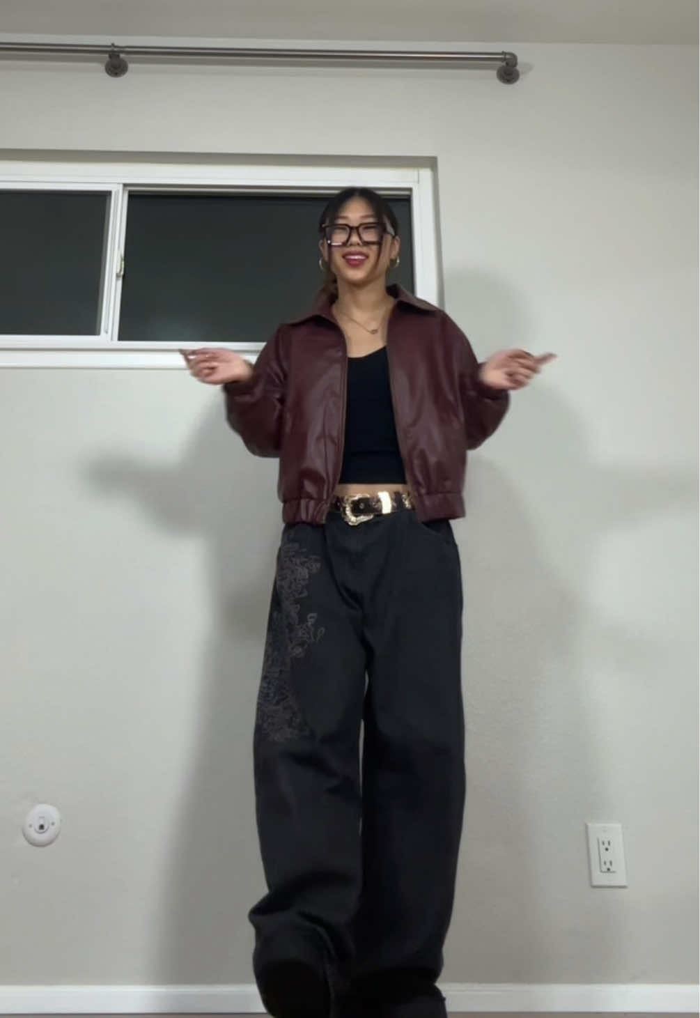 TikTok post by @lina.sunmee for Emmiol. Caption reads: love these jeans from @EMMIOL Denim (tag dc)....