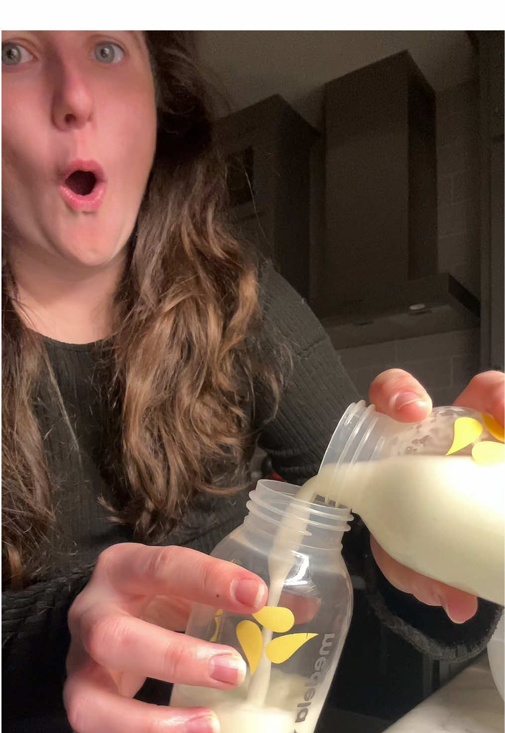 TikTok post by @brittanyandwinston for Mommed. Caption reads: And no spill?! @MomMed_Official #wearablepumps....