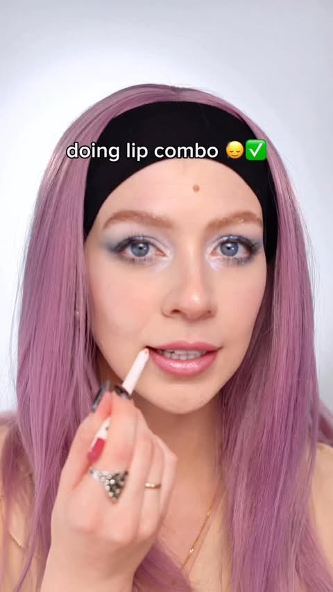 Instagram post by @stasyahops for Glossier. Caption reads: [...] 
@lorealparis Ballerina Shoes lipstick....