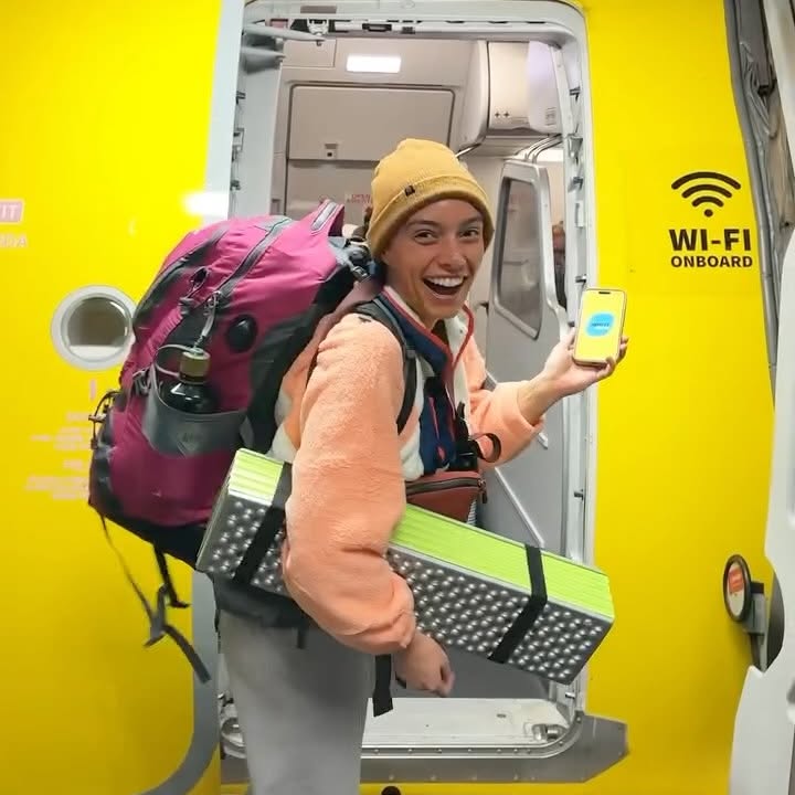 Instagram post by @tc.travels for Spirit Airlines. Caption reads: Why we flew @spiritairlines to hike Havasu Falls....