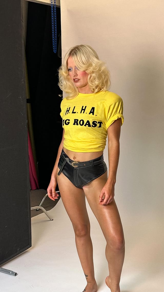 Instagram post by @neciashairstyling for Playboy. Caption reads: On set with Amy for playboy! My dream hair tho 💕....