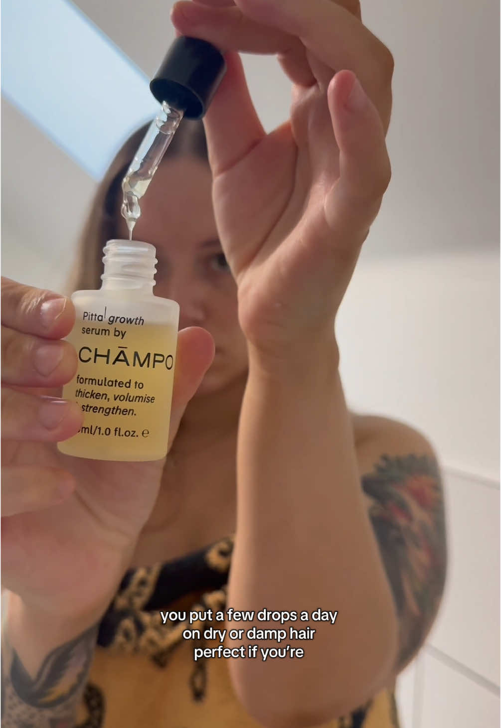 TikTok post by @alyshadevon for Chāmpo Haircare. Caption reads: I was completely humbled today by my postpartum....