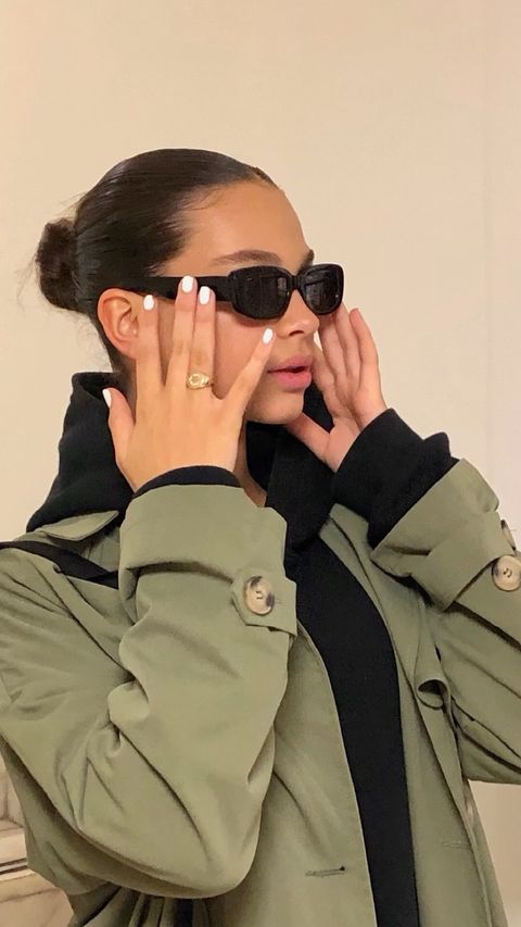 Instagram post by @emma.glg for MODELWERK. Caption reads: 🌱fall outfit inspo🍂 
♥ wearing the MW Belt Bag....