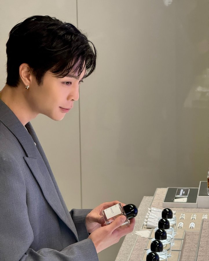 Instagram post by @nct for BYREDO. Caption reads: #NCT #JOHNNY with byredo @officialbyredo #ad.