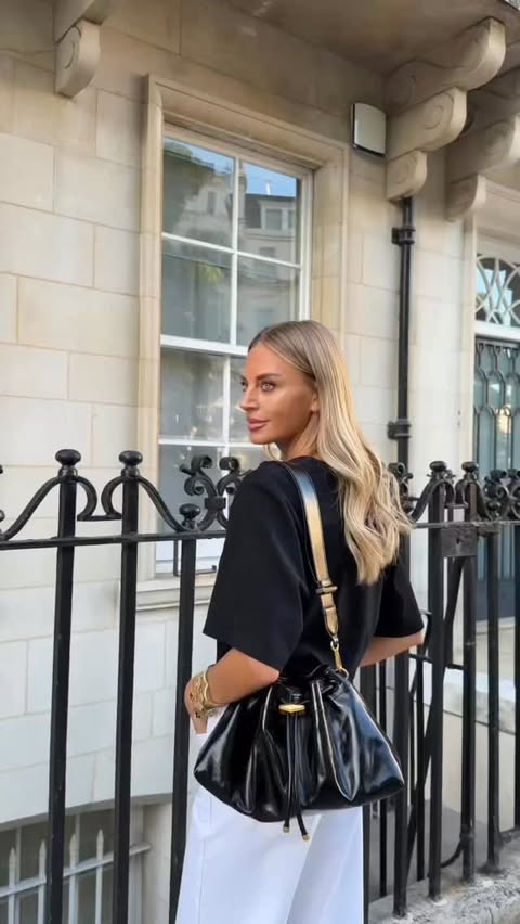 Instagram post by @thefashionbugblog for Jimmy Choo. Caption reads: [...] season, new bag. Im obsessed with my....