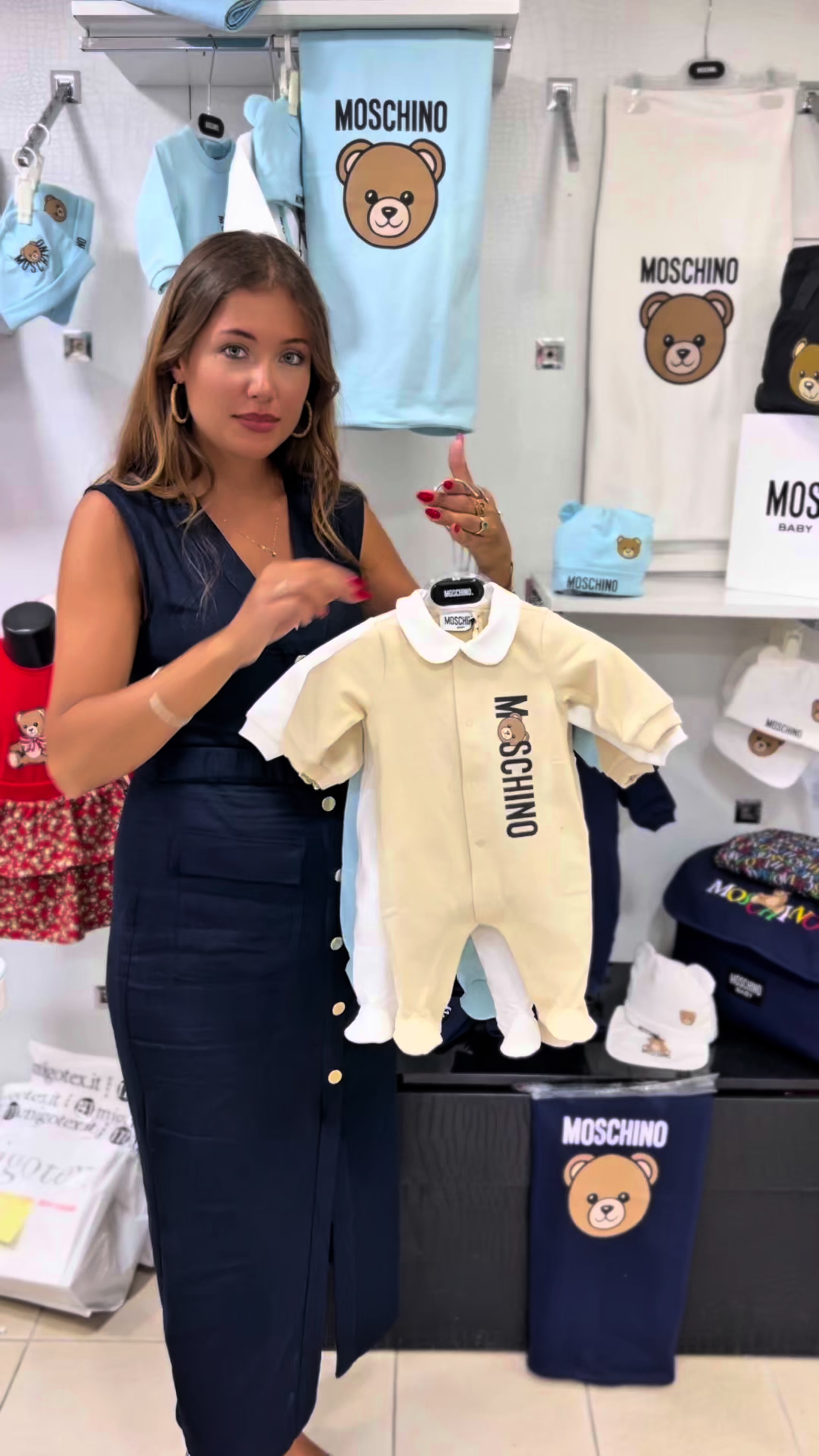 TikTok post by @migotex for Moschino. Caption reads: Voi quale preferite?? @Moschino Ordini WhatsApp....