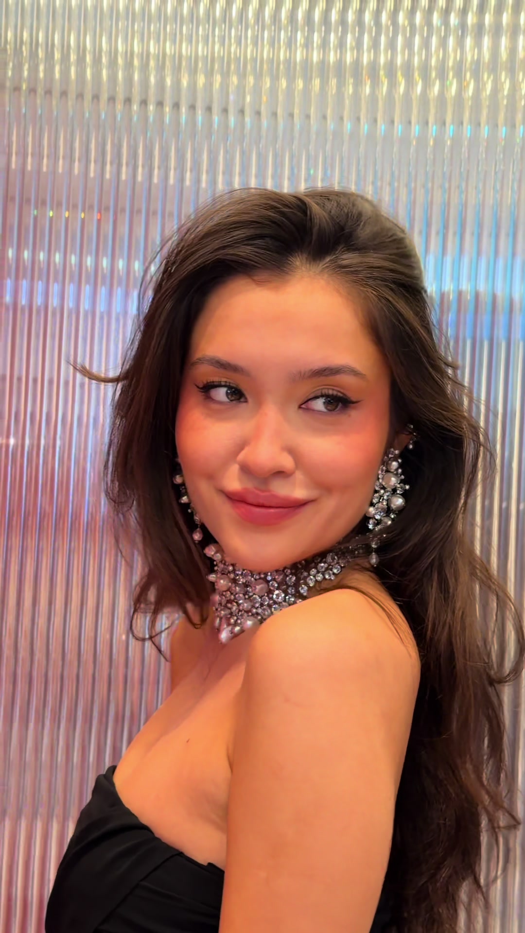 TikTok post by @janellezharmenovaa for Selfridges. Caption reads: [...] the @Disney UK x @Swarovski at the....