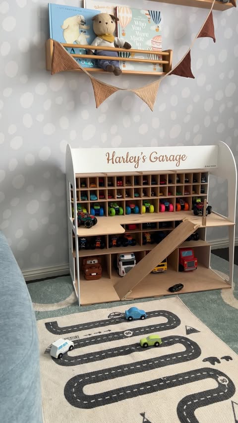 Instagram post by @abodeofash for Enjoy The Wood. Caption reads: [...] personalised car storage garage from....