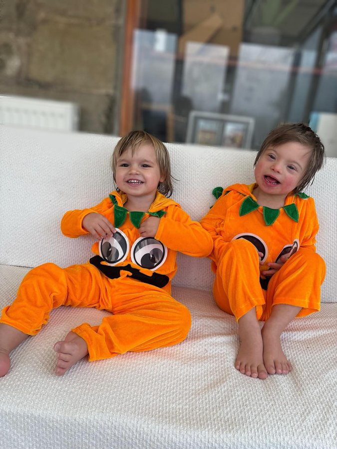 Instagram post by @mel_johnnyand_jaxon for Smiffys. Caption reads: [...] Treat together 👻 Pumpkin outfits from....