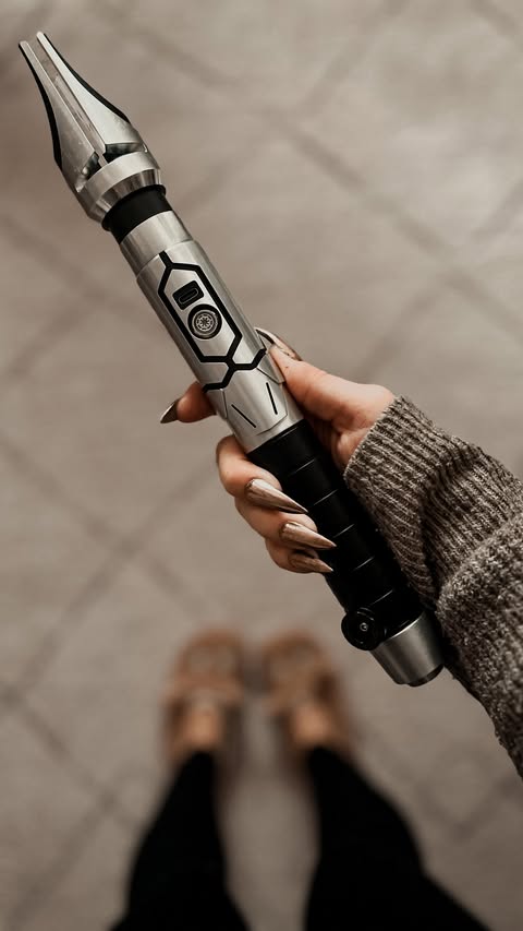 Instagram post by @bookatiepillar for KenJo Sabers. Caption reads: [...] #lightsaber #starwarsfan #starwars....