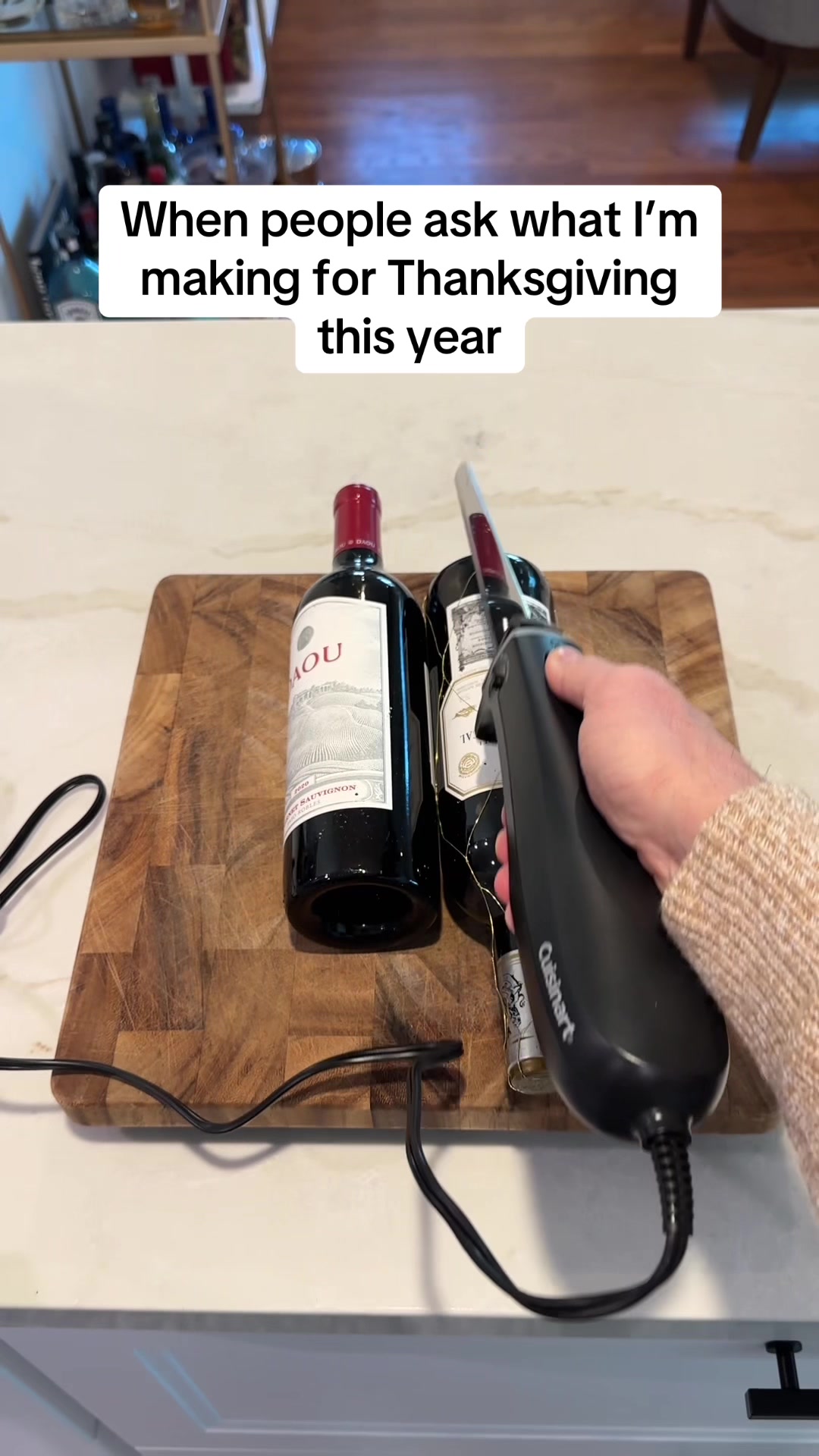 TikTok post by @officialchrismann for Cuisinart. Caption reads: This Thanksgiving recipe is a 10/10! 🍷 #relatable....