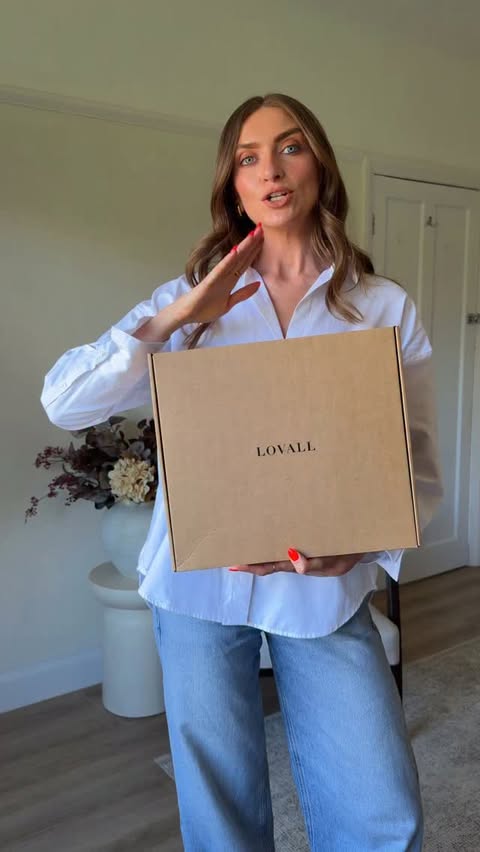 Instagram post by @emilyjbull for LOVALL. Caption reads: ad @lovallofficial’s summer sale has officially....
