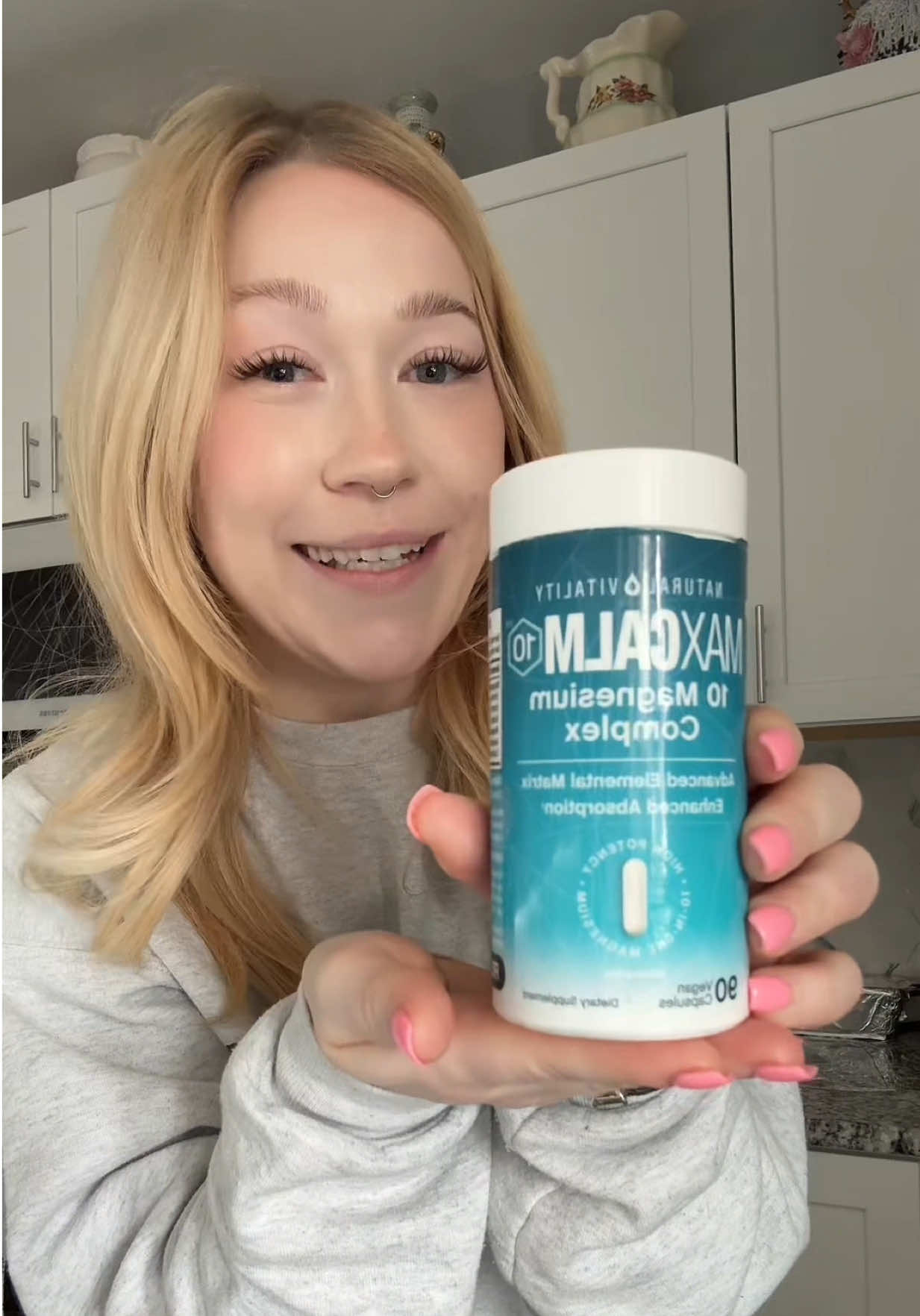 TikTok post by @itsbreannaastorm for Natural Vitality. Caption reads: [...] #moonface #bloating #musclerecovery....