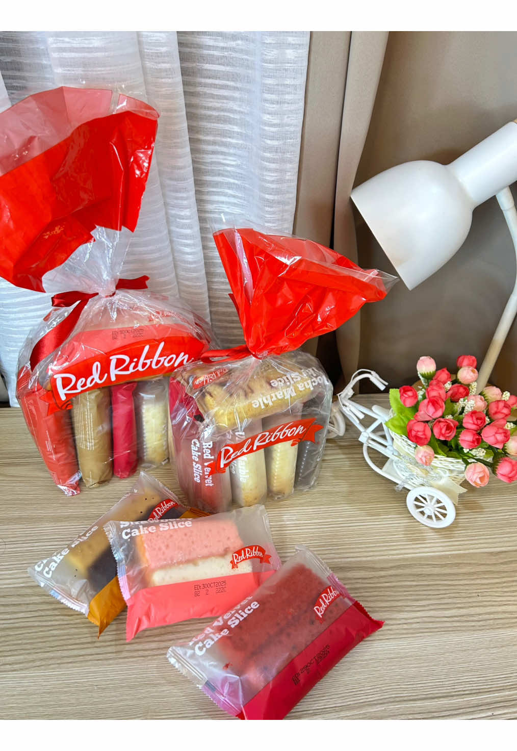 TikTok post by @joanbnonato for Red Ribbon Bakeshop. Caption reads: [...] he shares with his siblings. 🍰 @Red Ribbon....