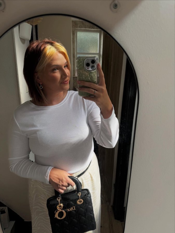 Instagram post by @_ugcbyvictoria for Skinnydip London. Caption reads: When the outfit’s simple, the accessories do the....