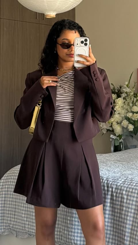 Instagram post by @islandgirlshaz for Meshki. Caption reads: Are we thinking outfit 1 or 2? Wearing @meshki....