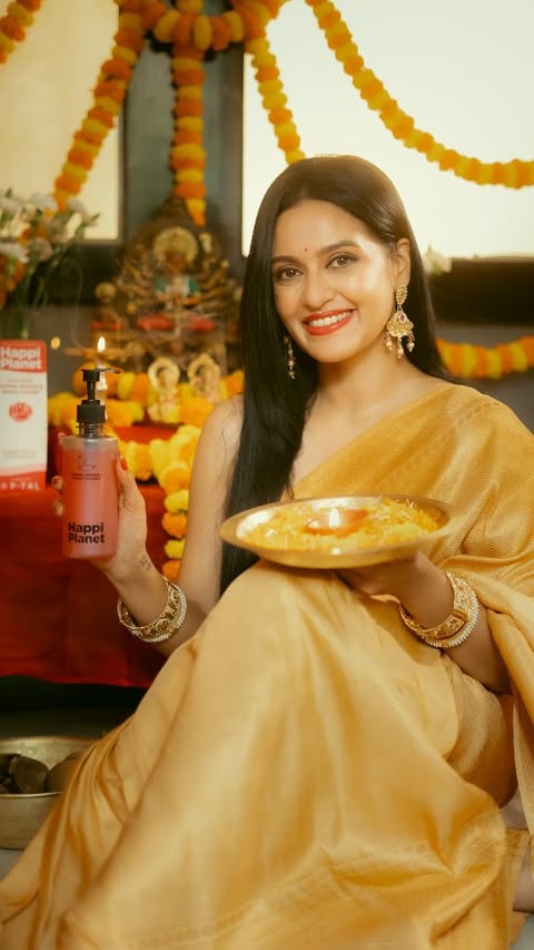 Instagram post by @priyankasarkarz for Happi Planet. Caption reads: [...] Pujo cleaning a little easier with Happi....
