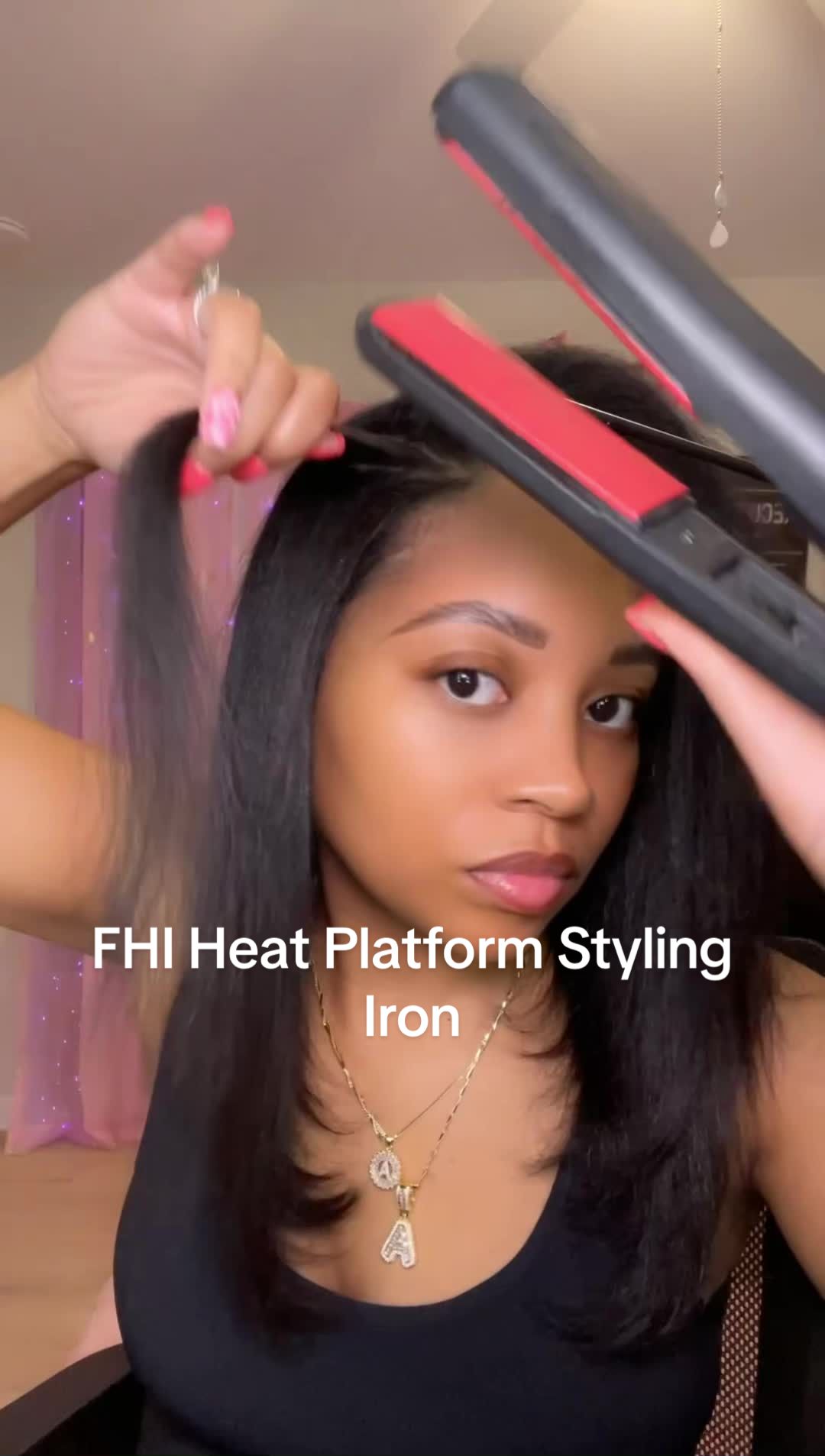 TikTok post by @lovely_lavishh for FHI Heat. Caption reads: [...] styling tool💕🤞🏾🔥 @FHI HEAT  #healthyhair....
