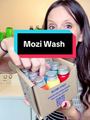 TikTok post by @steph_and_joey for Mozi Wash. Caption reads: Variety 9 Sample Pack Mozi Wash Scented Liquid....