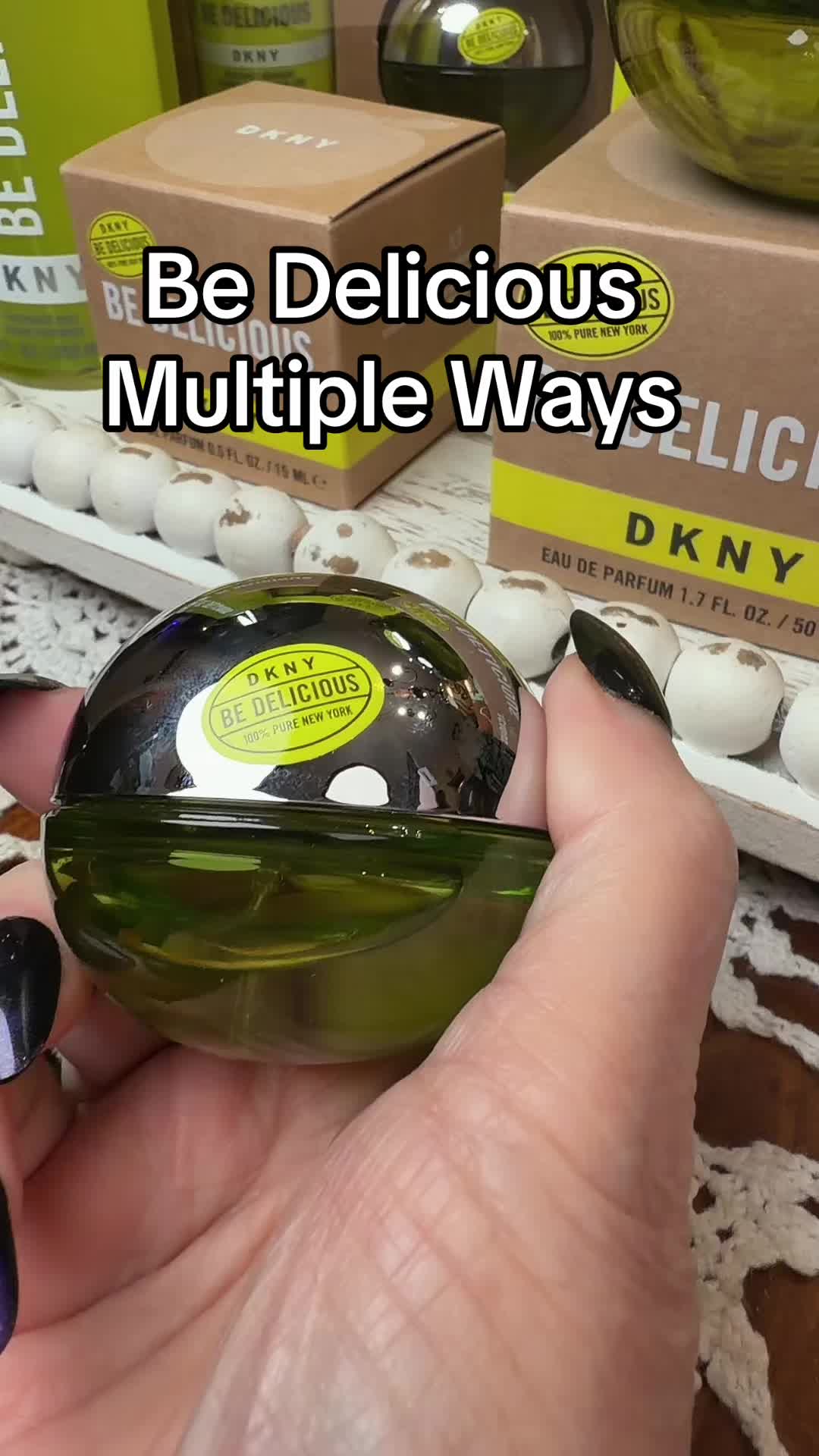 TikTok post by @bbobfan1 for DKNY. Caption reads: @DKNY #PerfumeSet #Perfumes [...].