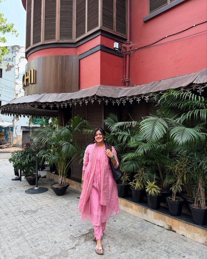 Instagram post by @_emaarkay for Aarni. Caption reads: Mishti- food, people 🤍

Wearing- @aarni.clothing.